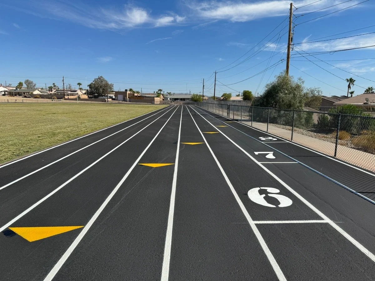 Running track under clear blue sky